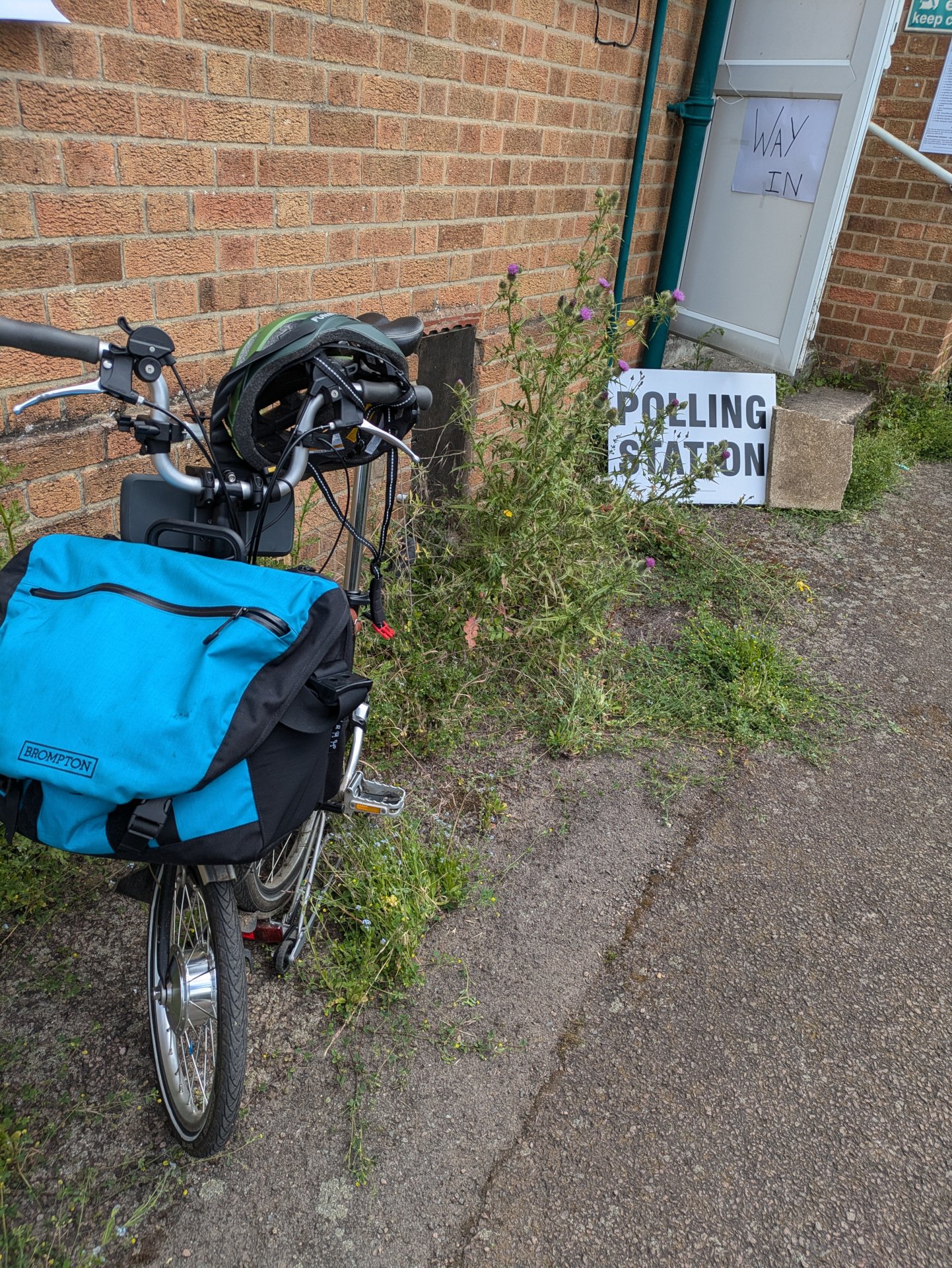 Mike's Brompton bike outside a Polling Station